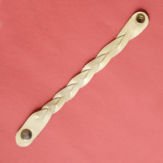 http://melissaesplin.com/2011/06/magic-braided-leather-tutorial/