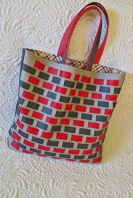 Faux leather woven bag