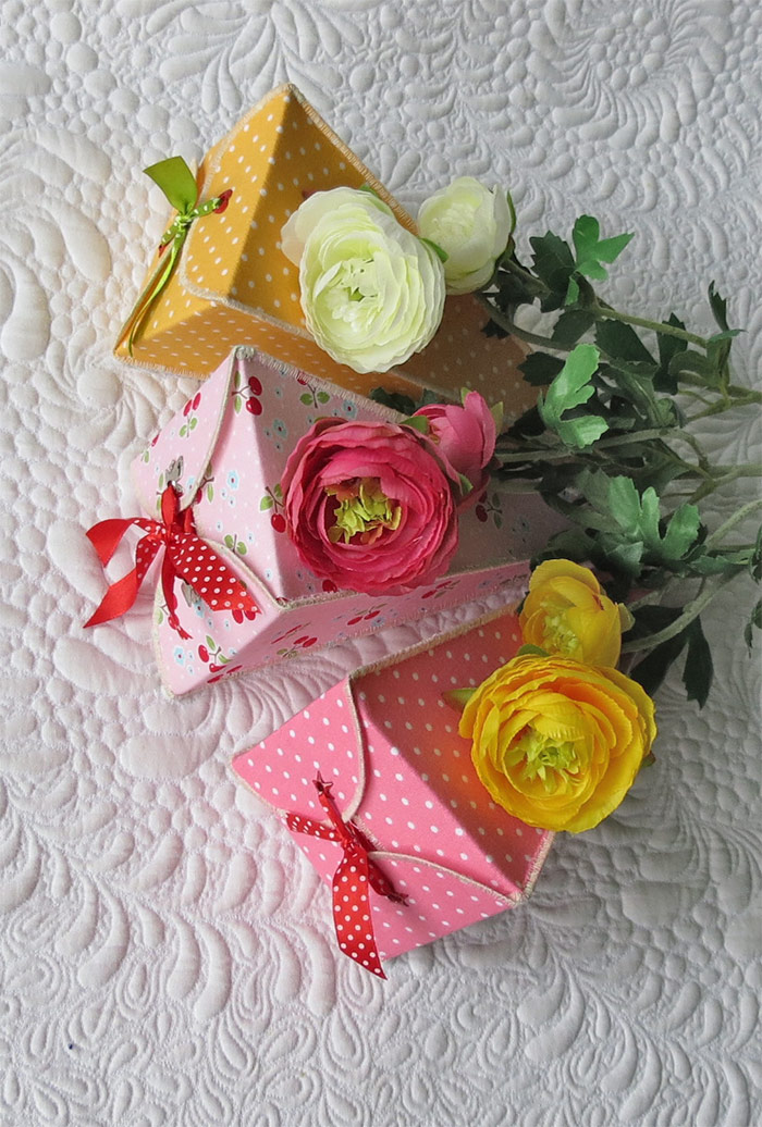 Sewing fabric treat boxes to welcome spring; sweet ideas for favors or decorations.